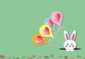 Red hearts on colourful balloons with bunny on pastel green background.